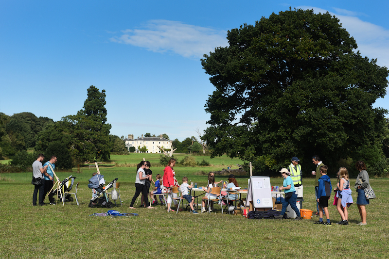 Families painting the landscape at Sharing Repton day at Catton Park