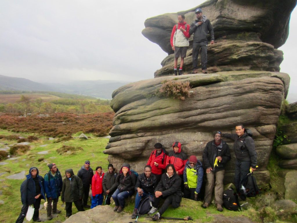 The Black Men Walking group out in the English landscape 