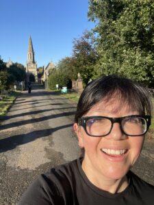 Ruth training for the London Marathon in a sunny park