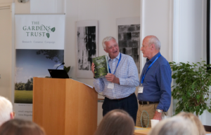 Roger Last with Peter Hughes at our Volunteer Celebration Day - Peter is holding a copy of Roger's book, Enticing Paths.