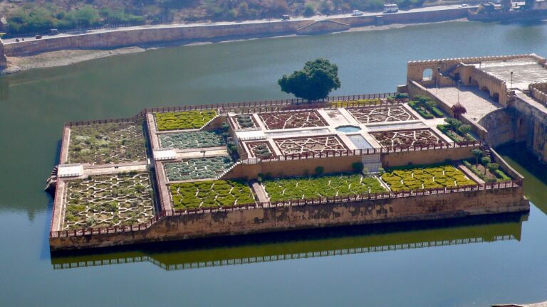 A photograph of a garden in India on a lake